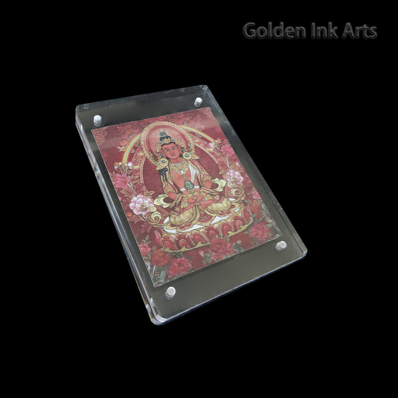 Side angled shot of the red Amitayus acrylic frame, showing the textured unbleached cotton canvas and the modern, clear protective casing