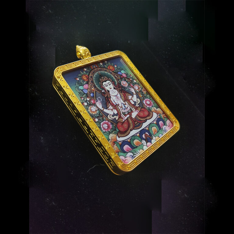 Angled view of a Four-Armed Guanyin (Chenrezig) Buddhist pendant in a gold-tone frame, the zodiac guardian for the Year of the Rat, symbolizing infinite compassion.