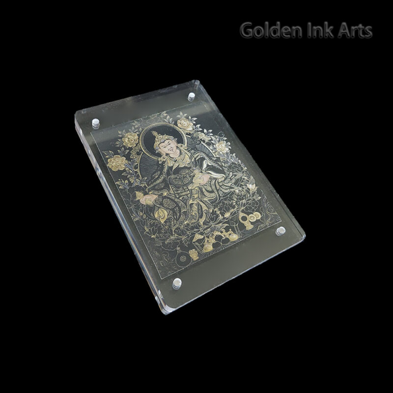 Side view of the Guru Rinpoche acrylic frame, showing the organic texture of the micro-spray cotton canvas and the premium transparent casing.