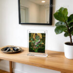 Green Dzambhala framed art styled in a modern living room, creating a refreshing, balanced, and prosperous family atmosphere.
