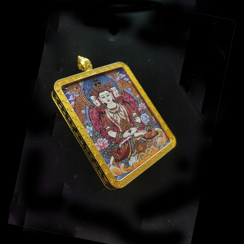 Angled view of Vairocana Buddha (Dainichi Nyorai) protection pendant in a gold-tone frame, the zodiac guardian for Sheep and Monkey, symbolizing supreme wisdom and enlightenment.