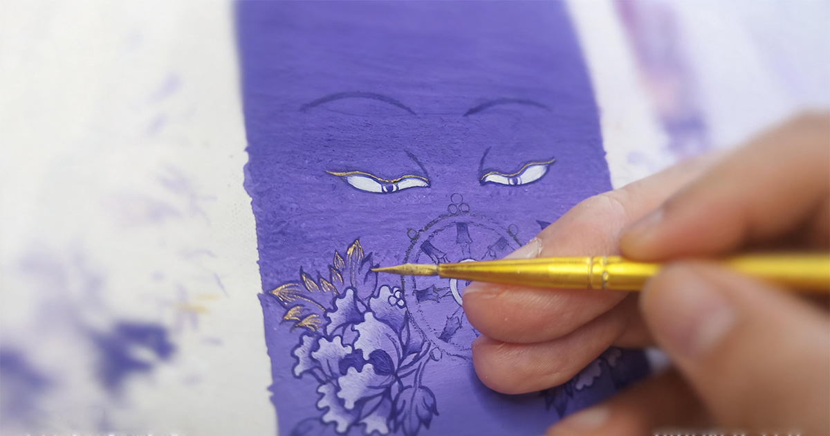 Hand-painting process of a purple Buddha Eyes Thangka with gold ink detailing and sacred geometry.