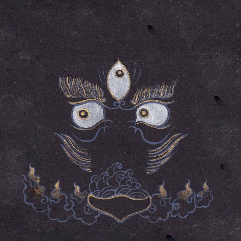 Striking three wisdom eyes of Black Dzambala with gold eyebrow flourishes and a skull bowl offering above blue-gold clouds on a textured charcoal black paper background.