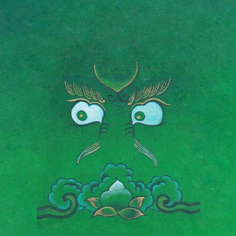 Fierce wisdom eyes of Green Dzambala with gold eyebrow flourishes looking down at a sacred wish-fulfilling jewel nestled in clouds on a rich emerald green background.
