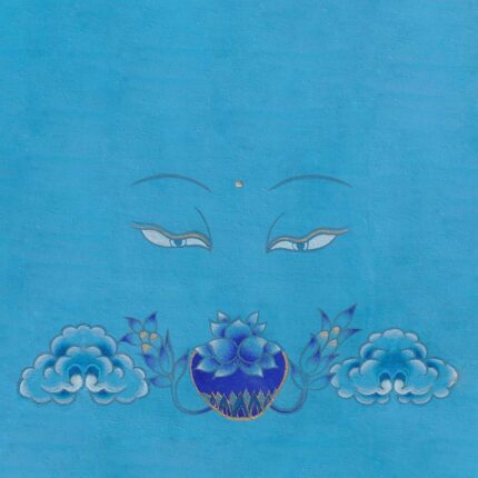 Serene blue Buddha eyes looking softly down at a lapis-blue medicine bowl adorned with lotus petals and cloud motifs on an azure blue textured background.