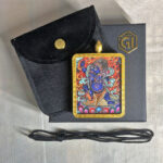 Blue Acala Gau box necklace displayed with black cord, velvet pouch, and gift box.