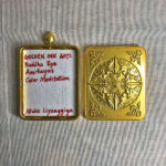 Inner view of brass Gau box featuring artist signature card and custom backplate.