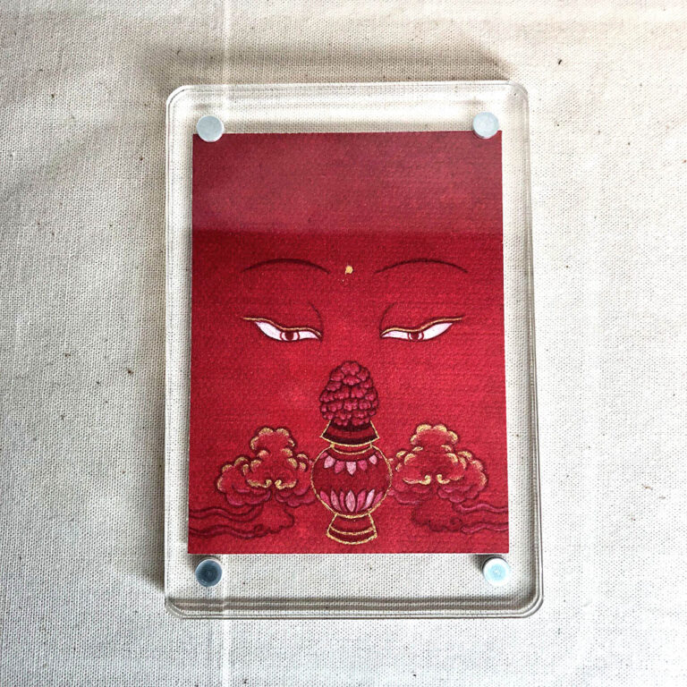 Frontal view of Amitayus Buddha Eyes acrylic block for red color meditation.