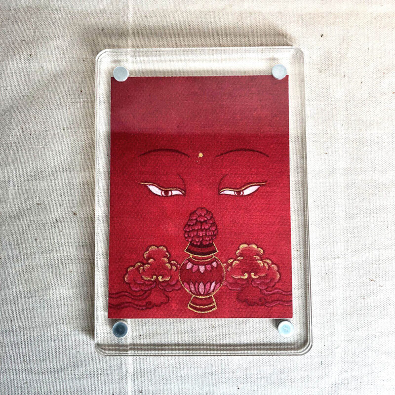 Frontal view of Amitayus Buddha Eyes acrylic block for red color meditation.