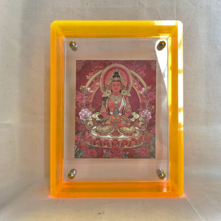 Front view of red Amitayus Thangka print in a yellow floating translucent acrylic frame.