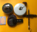 Traditional Chinese calligraphy tools four treasures including brush inkstone and seals on yellow background