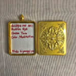 Inner view of brass Gau box featuring artist signature card and custom backplate.