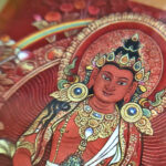 Close-up of HD giclée Amitayus Thangka print showing red Buddha deity and fine line work.