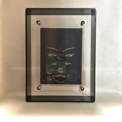 Front view of Padmasambhava Buddha Eyes print in a black floating translucent acrylic frame.