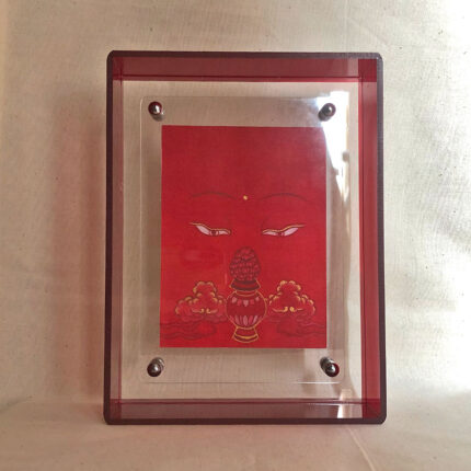Front view of red Amitayus Buddha Eyes print in a red floating translucent acrylic frame.