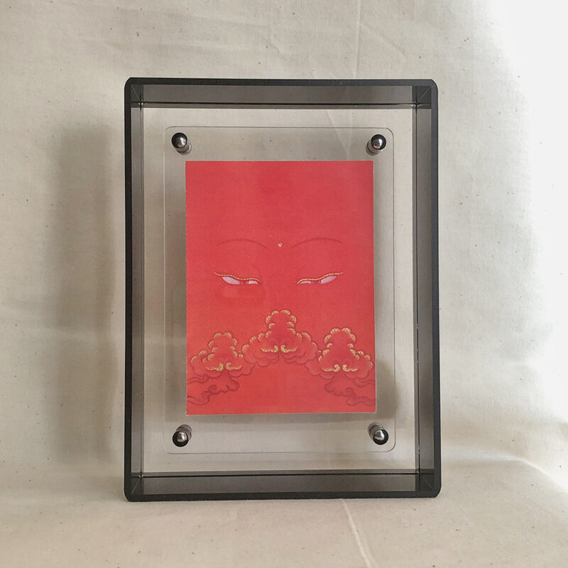 Front view of Shakyamuni Buddha Eyes print in a black floating translucent acrylic frame.