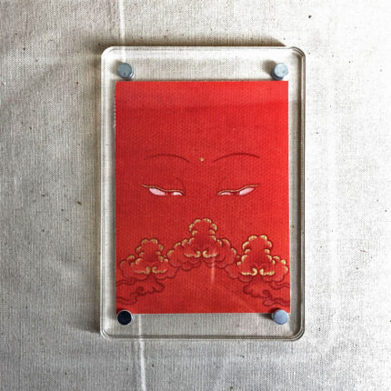 Frontal view of Shakyamuni Buddha Eyes acrylic block for orange color meditation.