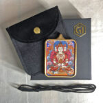 Vairocana Gau box necklace displayed with black cord, velvet pouch, and gift box.