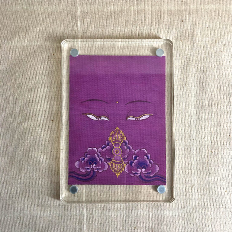Frontal view of Vajrasattva Buddha Eyes acrylic block for purple color meditation.