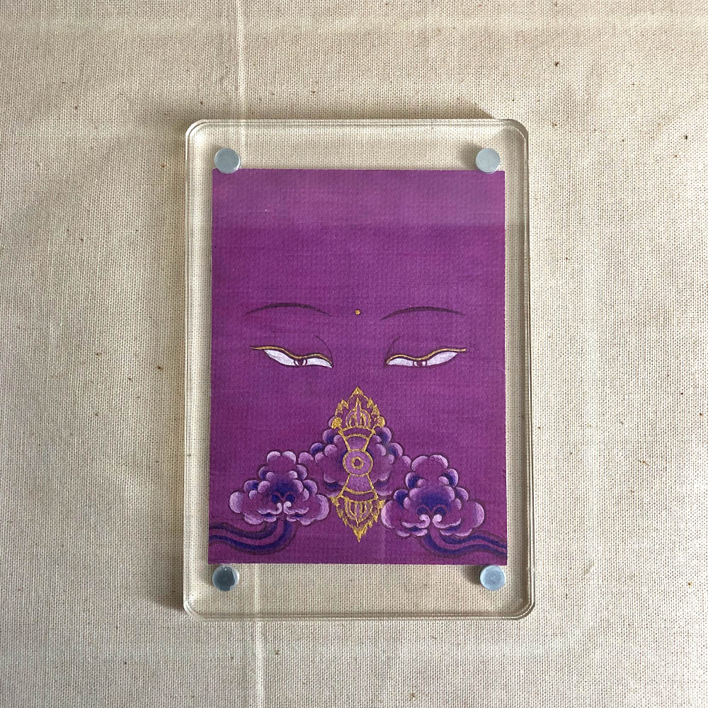 Frontal view of Vajrasattva Buddha Eyes acrylic block for purple color meditation.