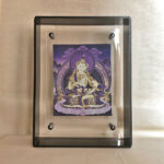 Front view of purple Vajrasattva Thangka print in a black floating acrylic frame.