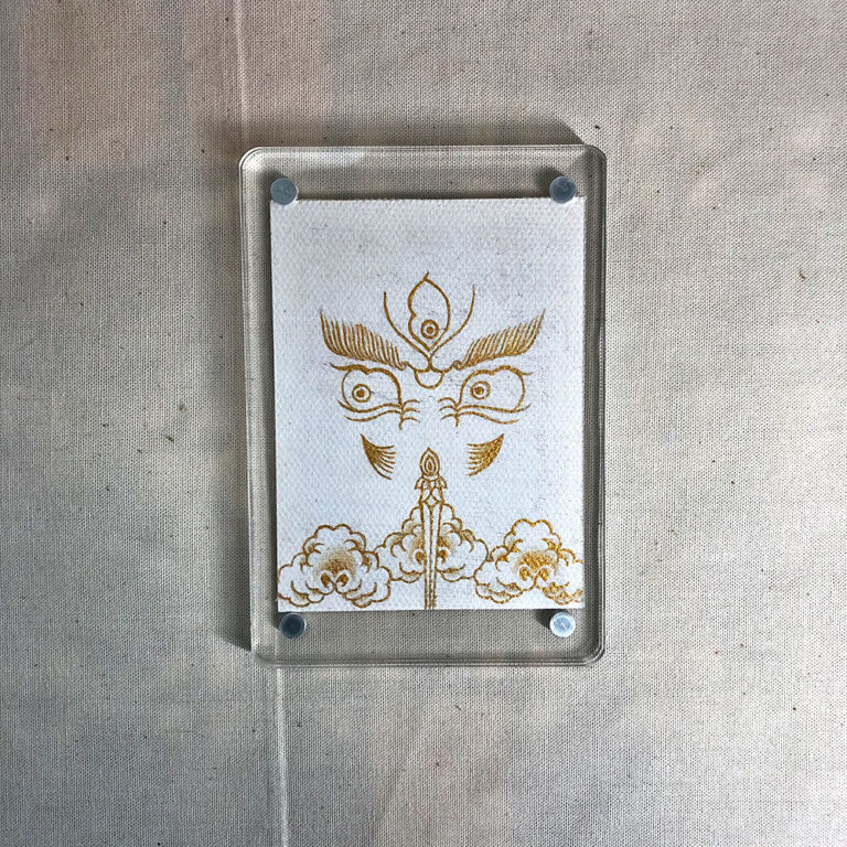 Frontal view of White Jambhala Buddha Eyes acrylic block for white color meditation.