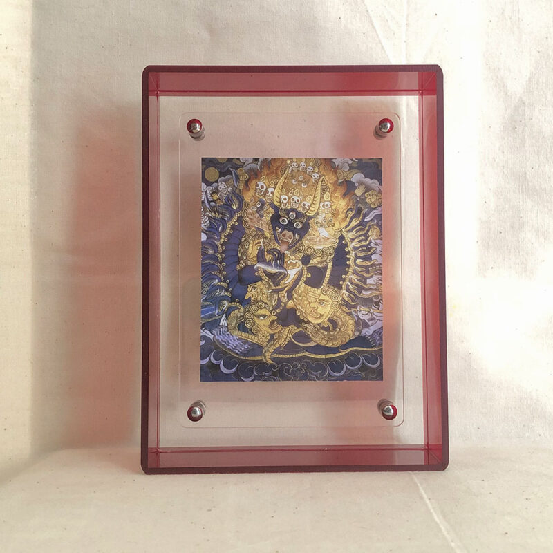 Front view of Yamantaka Buddhist Thangka print in a red floating acrylic frame.