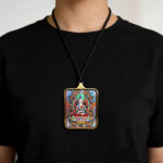 Gold Ghau pendant with AI-reinterpreted Akasagarbha Thangka art
