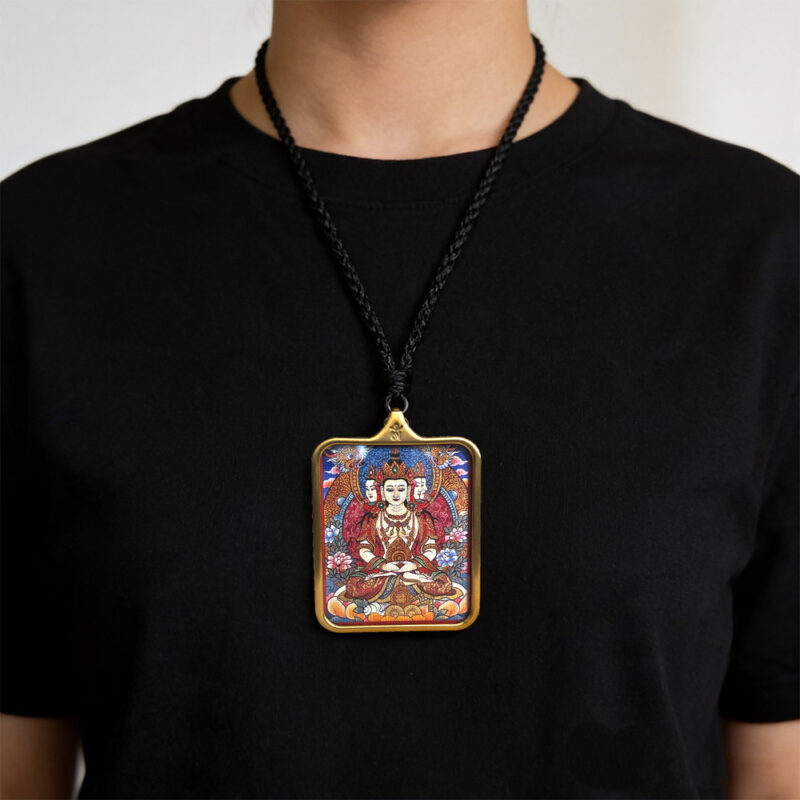 Mahavairocana Thangka-inspired art in rectangular gold Ghau pendant