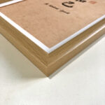 Macro detail of smooth natural oak wood frame corner for A4 friendship art display