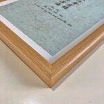 Macro detail of smooth natural wood frame corner for A4 calligraphy art display