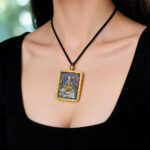 Samantabhadra Thangka-inspired artwork in artisan gold Ghau pendant