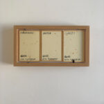Rear view of the 3 calligraphy panels with English handwritten labels for Shan, Shui, and Qing