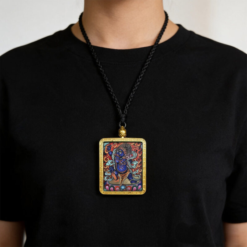 Dark color energy Vajrapani artwork in artisan gold Ghau pendant